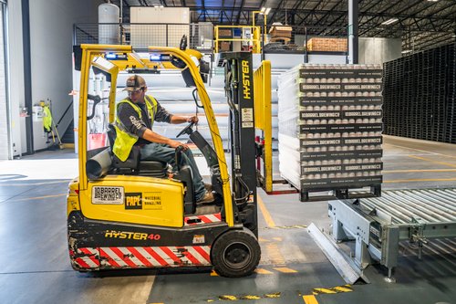 warehouse-worker-using-forklift