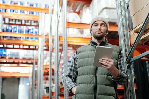 warehouse-manager-holding-tablet