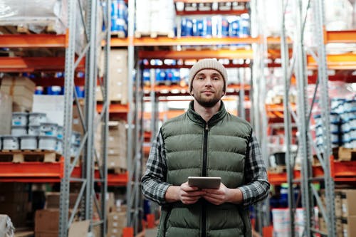 warehouse-manager-holding-tablet