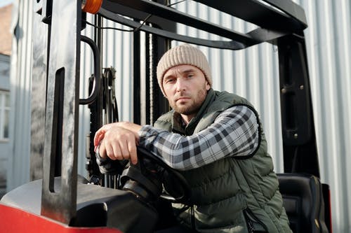 man-sitting-in-forklift